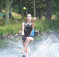 Alexis Del Cid multi-tasking; pictured here water skiing and juggling at the same time.